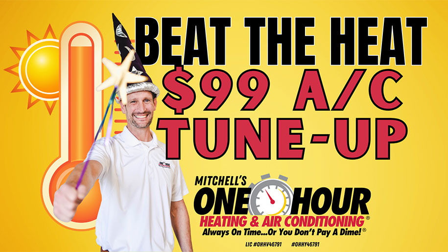 A smiling man in a wizard hat holds a star wand in front of a large thermometer graphic. Bold text reads, BEAT THE HEAT $99 A/C TUNE-UP. Below is the logo for Mitchell’s One Hour Heating & Air Conditioning.